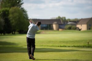 Man playing golf