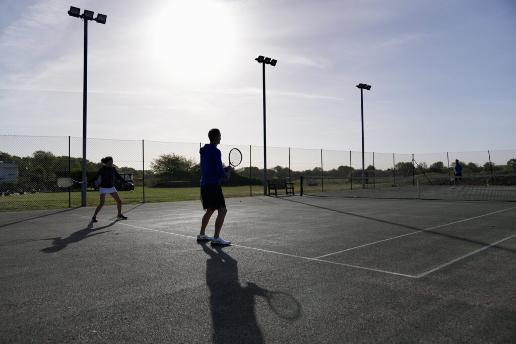 people playing tennis