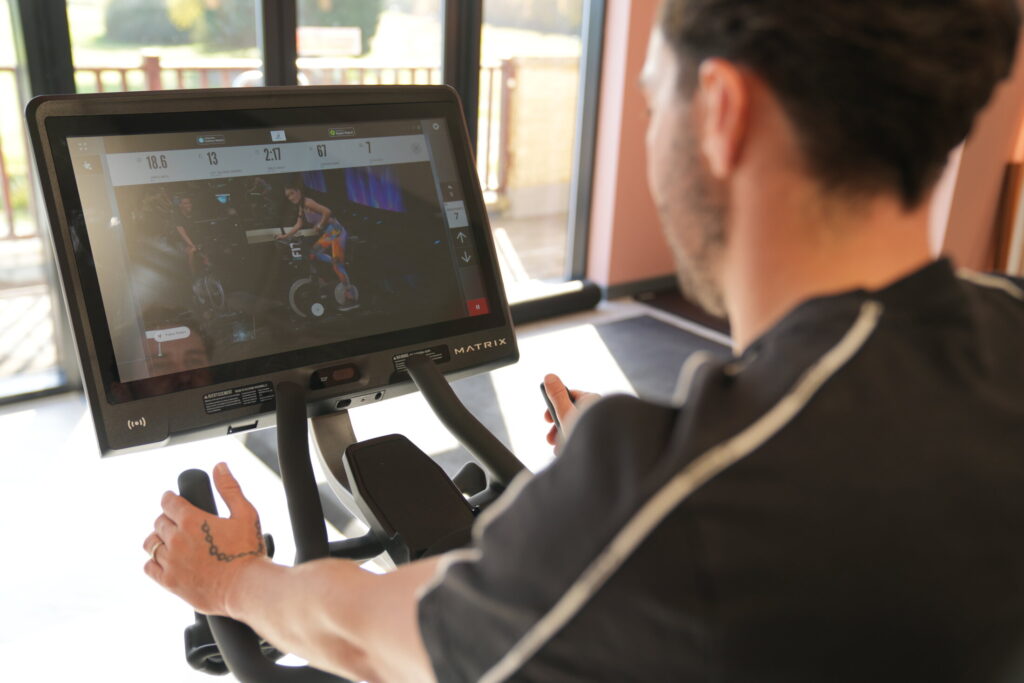 gym member on a gym bike