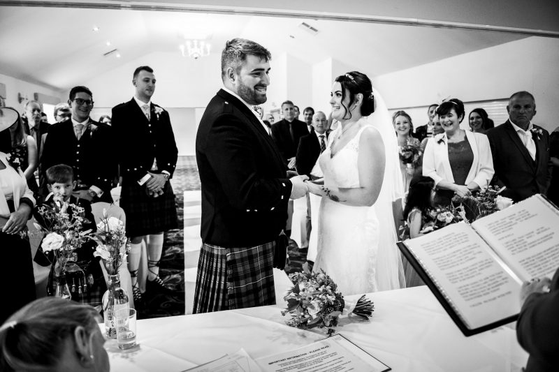 Wedding couple saying vows