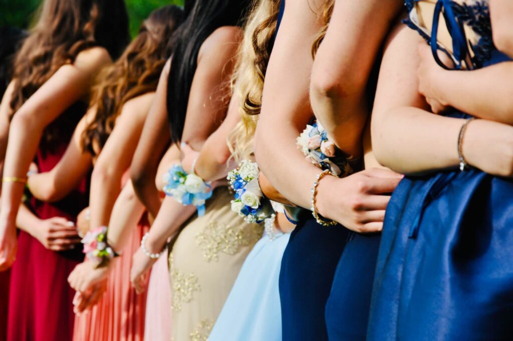 Prom guests hugging