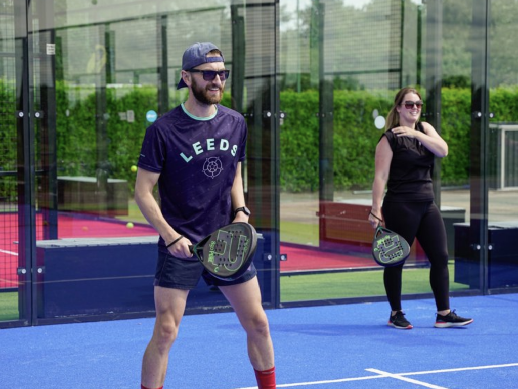man and women playing padel at Bicester, Oxfordshire