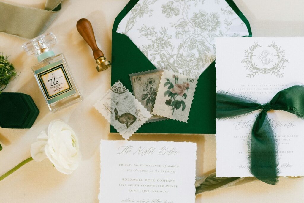 a table topped with lots of different wedding invitation basics