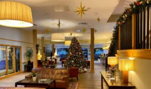 the foyer of bicester hotel and spa with christmas decorations
